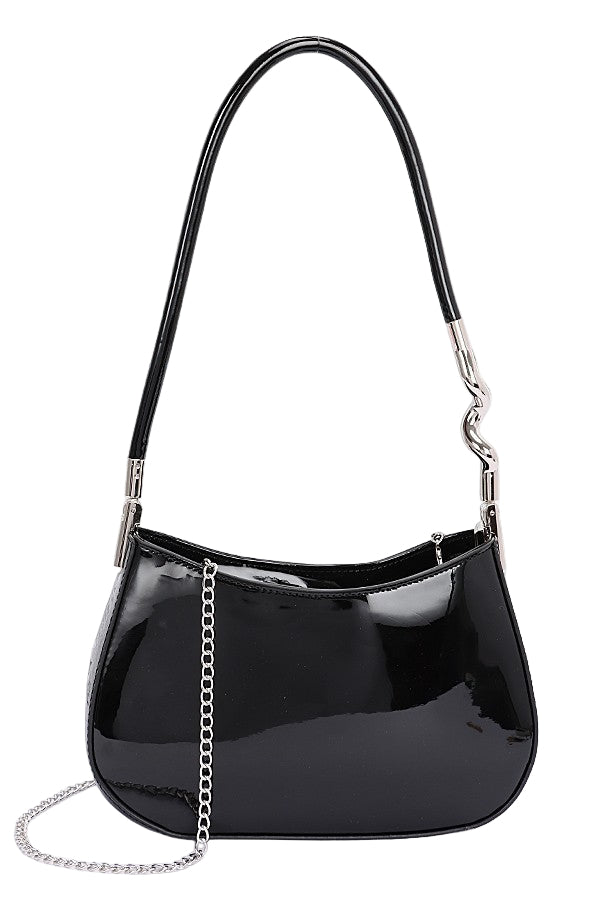 Black patent leather handbag with a chain detail on a white background