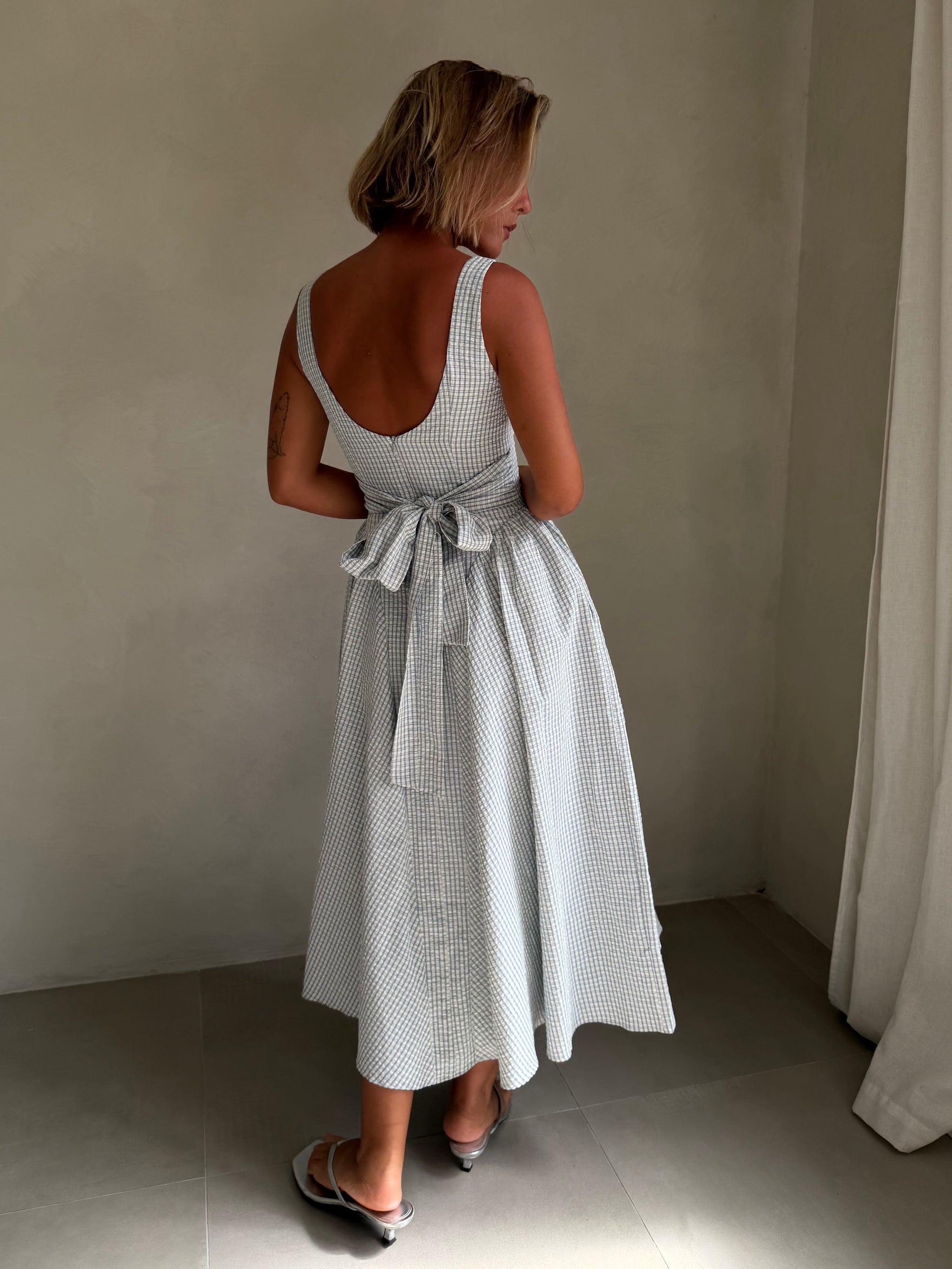Vinya Plaid Bow-Back Midi Dress by ASTR Moni & Coli Vinya Plaid Bow-Back Midi Dress by ASTR Moni & Coli